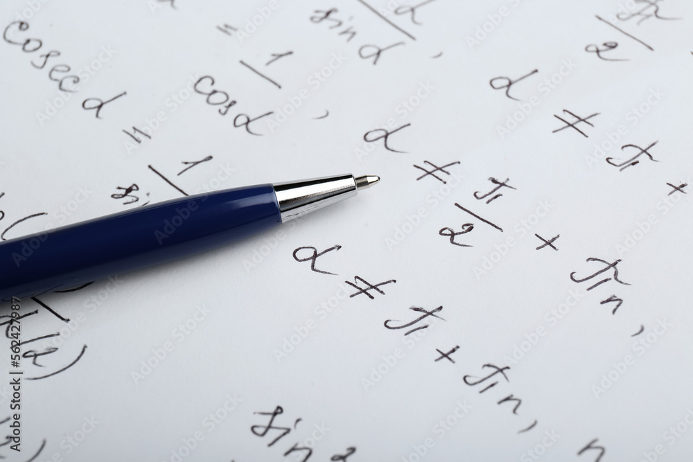 Fototapeta premium Sheet of paper with different mathematical formulas and pen, closeup