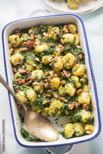 Italian gnocchi with Gorgonzola cheese, spinach and walnuts