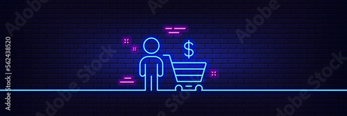 Neon light glow effect. Buyer with shopping cart line icon. Customer sign. Supermarket client symbol. 3d line neon glow icon. Brick wall banner. Buyer outline. Vector