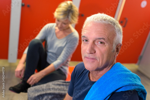 mature man in fitness club locker room