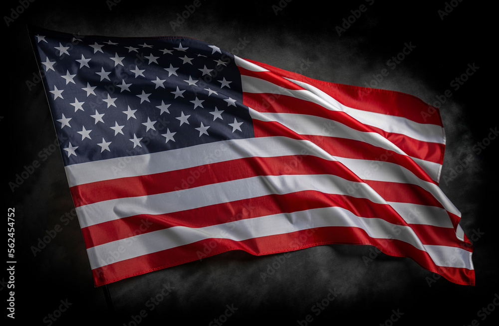 American flag on dark background. USA flag on a black background. - obrazy, fototapety, plakaty 
