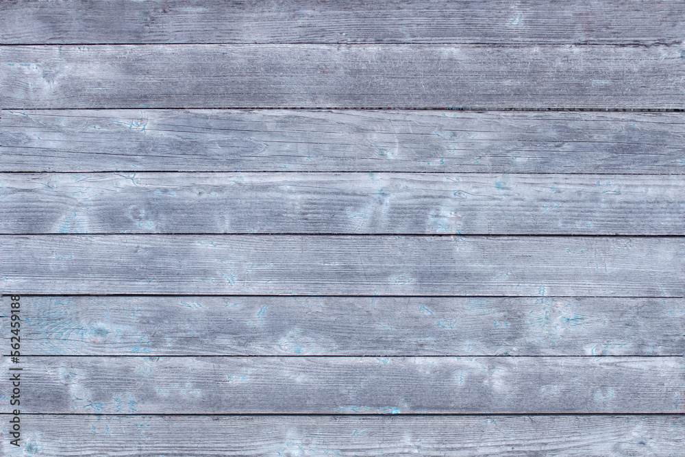 Obraz premium Wooden grey background. An old natural wooden table with a place to place the product.