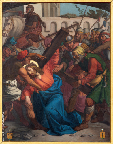 LUZERN, SWITZERLAND - JUNY 24, 2022: The painting Simon of Cyrene helps Jesus carry the cross as part of Cross way stations in the church Franziskanerkirche from 19. cent.