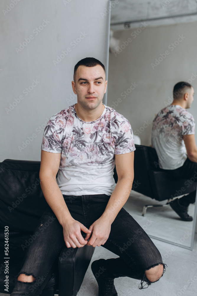 Obraz premium Fashion stylish male portrait. Young handsome man in studio