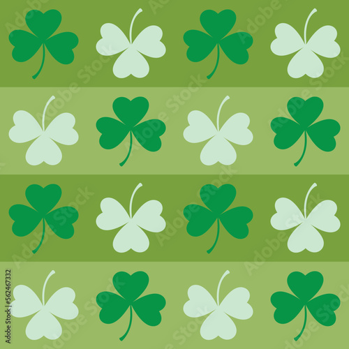 Saint Patrick's Day greetings with tree leaf clovers on green background.