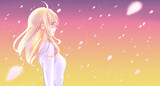 穏やかな表情の女性　桜吹雪　逆光　夕暮れ