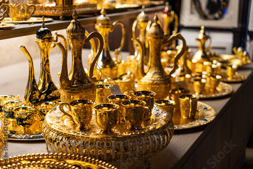 Photography Various colorful expensive souvenirs on the counter in the store at the bazaar in city of Dubai