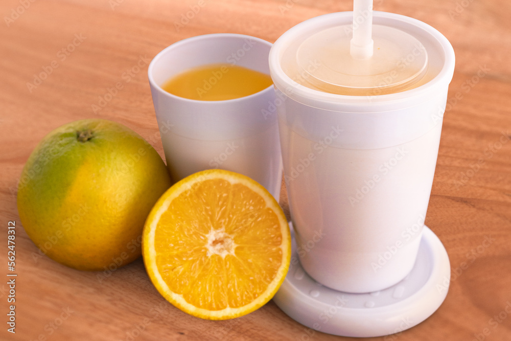 Glass of guava juice on wooden background Glass of guava juice on wooden background
