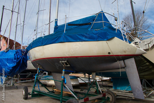 Yachts wrapped up for winter storage, Lipno marina. Czech Republic.