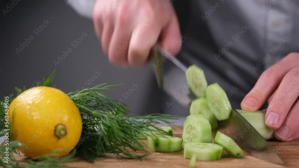 chef cutting cucumber chef cutting cucumber