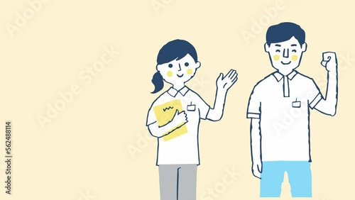 笑顔で案内をする男女のスタッフ　上半身