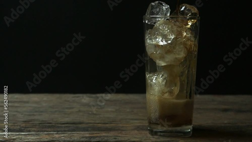 FHD formate, Solt drink being poures into a glass with ice photo