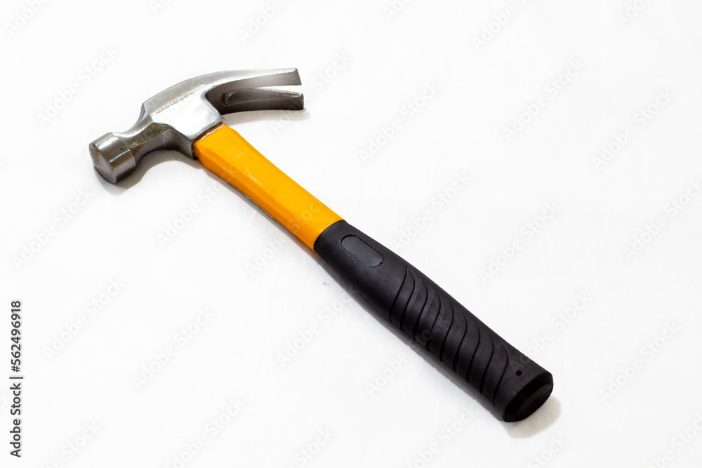 black and yellow hammer on white background black and yellow hammer on white background