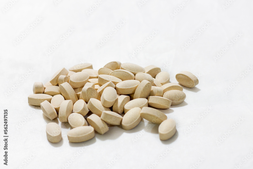 group of pills on white background
