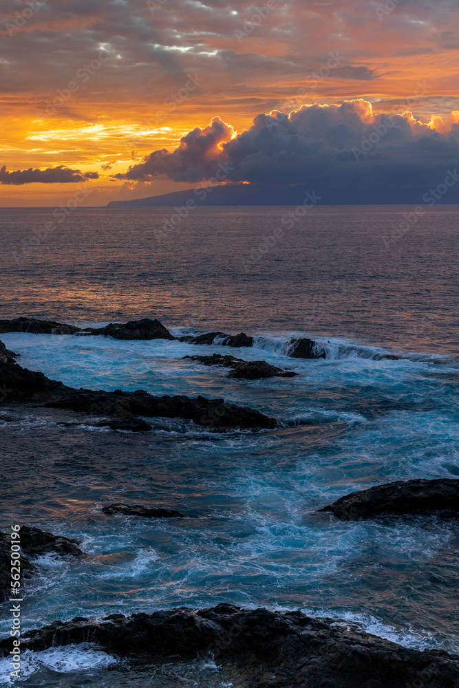Sunset over the ocean and La Gomera island, one of Spain's Canary Islands