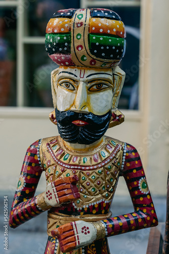 Detail of a wooden statue on a city street Udaipur, Rajasthan, India. Closeup
