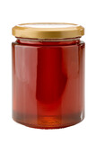 Glass jar with chestnut honey