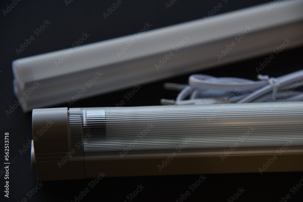LED lamp on a black background. Lighting device.