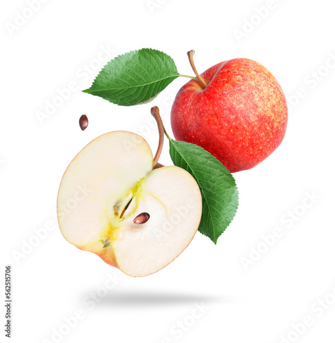 Whole and half of an apple close-up on a white background
