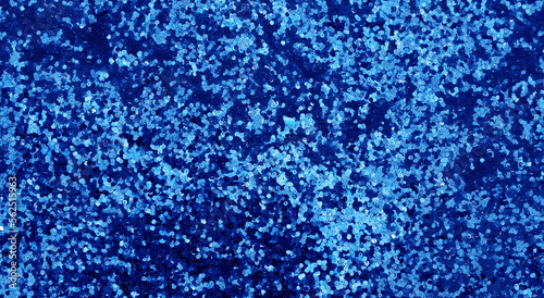 Sequins blue metallic glitter background,sparkling sequined textile. Abstract texture.Selective focus.
