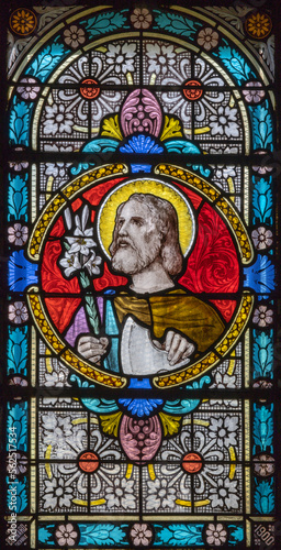 CHAMONIX, FRANCE - JULY 5, 2022: The St. Joseph on the stained glass in the church St. Michael by Antonine Bernard (1900).