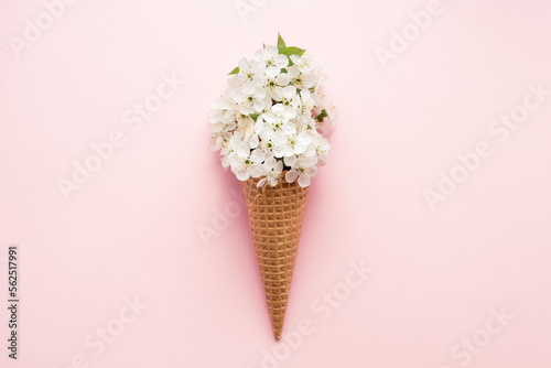 Fototapeta Naklejka Na Ścianę i Meble -  Ice cream cone with white cherry blossom