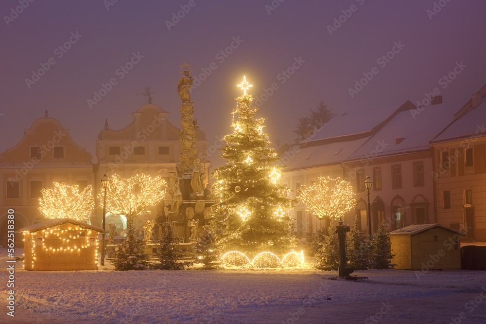 Christmas decorations with lights, trees and market in the night in UNESCO town Telč, Czech Republic, Europe