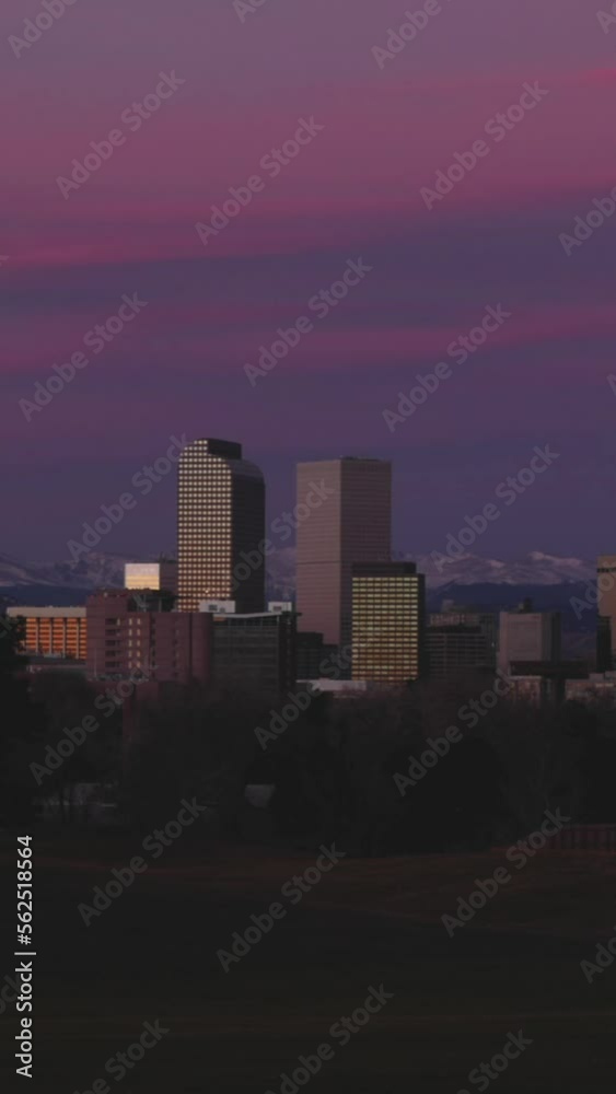 Vertical Video Pink Clouds over Denver Skyline Time Lapse