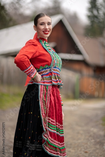 Young beautiful slovak woman in traditional dress. Slovak folklore