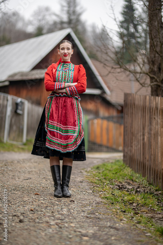 Young beautiful slovak woman in traditional dress. Slovak folklore