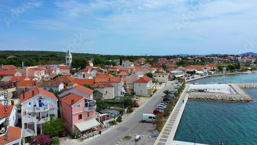 Petrcane village tourist destination coastline aerial panoramic view, Dalmatia region of Croatia. Aerial top view of village Petrcane, Croatia. Petrcane aerial view, Dalmatia region of Croatia photo