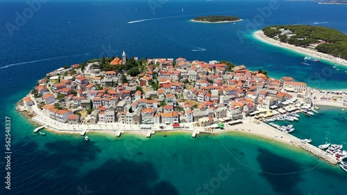 Aerial view of Primosten old town on the islet, Dalmatia, Croatia. Primosten, Sibenik Knin County, Croatia. Resort town on the Adriatic coast. Aerial view of adriatic town Primosten, Croatia
