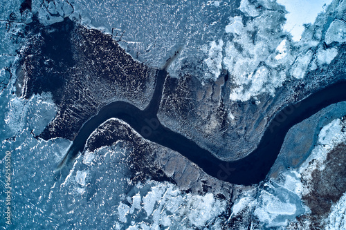 aerial view from icy river in winter