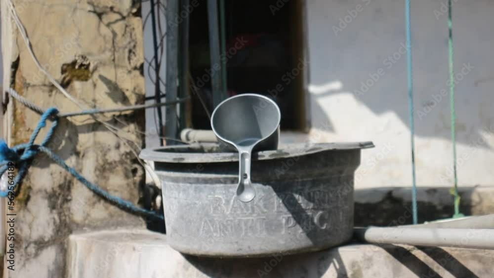 Sumenep Madura Indonesia 19 January 2023, Sturdy and Durable Dipper and Bathtub. Sumenep Madura Indonesia 19 January 2023, Sturdy and Durable Dipper and Bathtub.