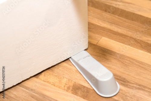 Door stopper to prevent door from moving