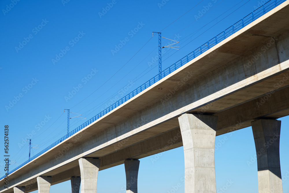 Low angle view of bridge against clear blue sky Low angle view of bridge against clear blue sky