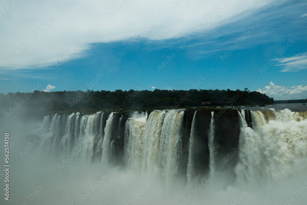 Scenic view of Iguazu Falls against sky Scenic view of Iguazu Falls against sky