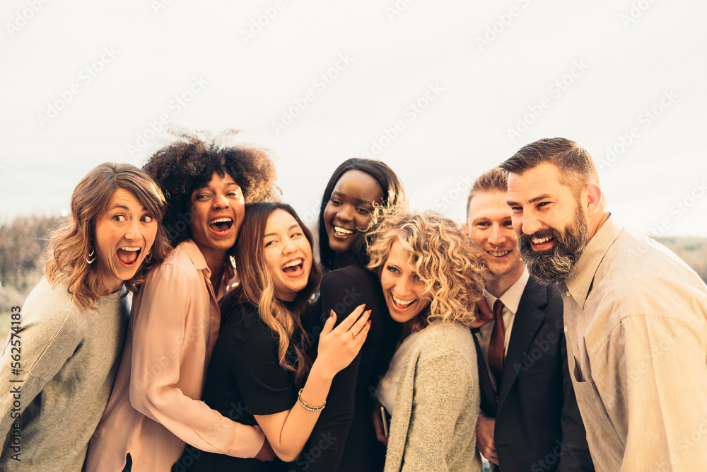Cheerful business people looking away against clear sky Cheerful business people looking away against clear sky