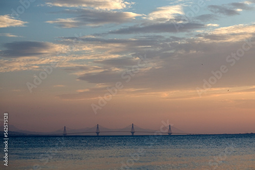 A view of the Rio-Antirio Bridge from the Gribovo beach in Nafpaktos, Greece. photo