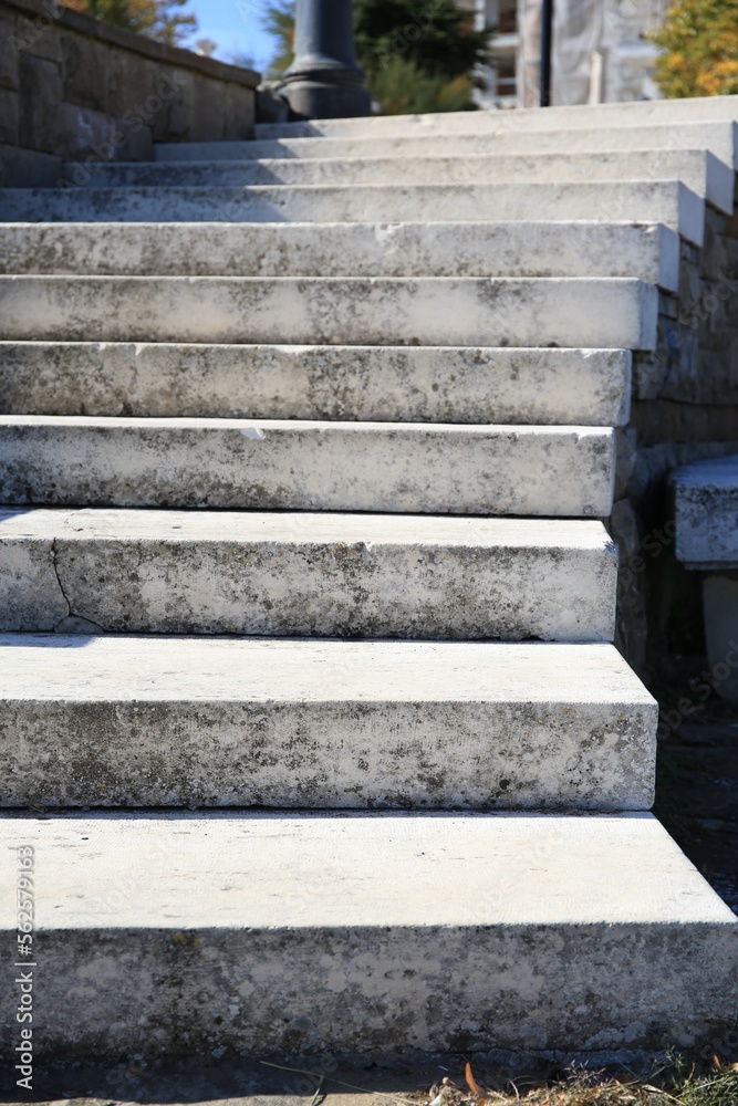 View of empty old concrete staircase outdoors on sunny day View of empty old concrete staircase outdoors on sunny day
