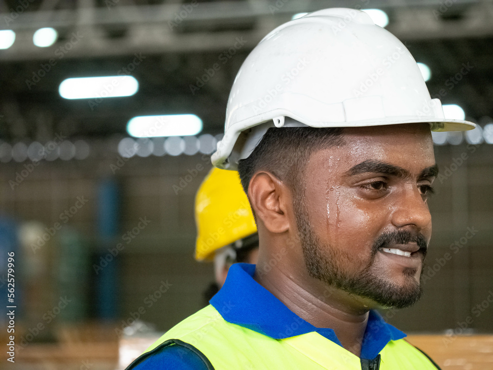 Person black skin african india middle east head shot face wear white hardhat helmet safety warehouse construction employee labor staff employee work job construction engineer happy smile concept Person black skin african india middle east head shot face wear white hardhat helmet safety warehouse construction employee labor staff employee work job construction engineer happy smile concept