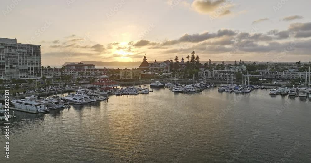 San Diego California Aerial v103 cinematic low flyover glorietta bay and famous beachfront hotel del coronado at sunset golden hour, romantic hollywood scene - Shot with Mavic 3 Cine - September 2022 San Diego California Aerial v103 cinematic low flyover glorietta bay and famous beachfront hotel del coronado at sunset golden hour, romantic hollywood scene - Shot with Mavic 3 Cine - September 2022