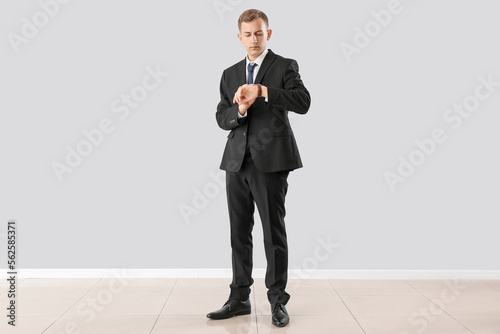 Handsome businessman lookin...