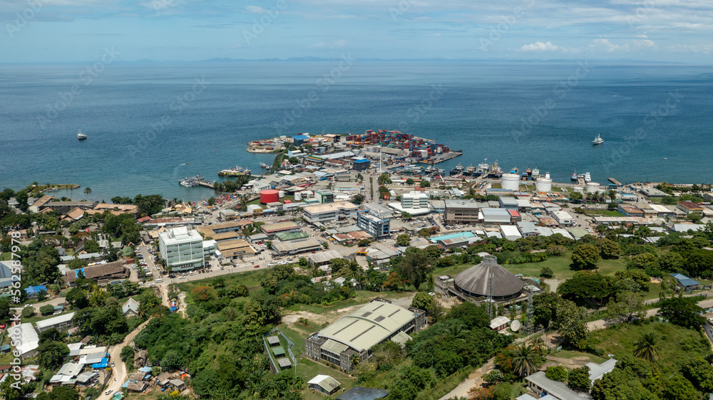 Aerial view of the National Parliament grounds looking down to the seaport and wharves.
