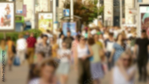 Wallpaper Mural Crowd of People / Commuters Walking / Busy Street. Crowd on a busy street. People walk down a busy street with advertising, billboards, cars and public transport. Slow motion. Hot summer day. Torontodigital.ca