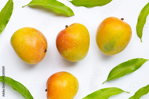 Mango, Tropical fruit with leaves on white background. Top view