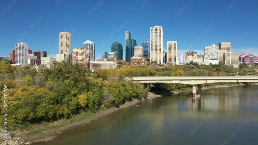 Aerial drone view of the North Saskatchewan River and downtown Edmonton during autumn fall as seen from the Rossdale area. The James Macdonald Bridge is also featured. Aerial drone view of the North Saskatchewan River and downtown Edmonton during autumn fall as seen from the Rossdale area. The James Macdonald Bridge is also featured.