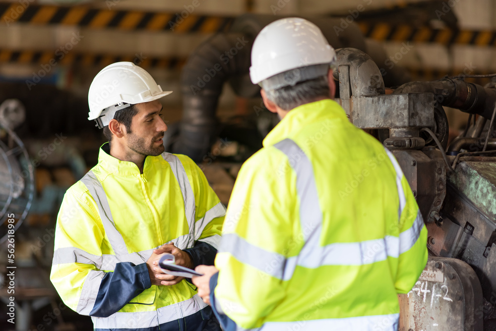 Worker at machine in factory, Metal industry worker at factory. Worker at machine in factory, Metal industry worker at factory.