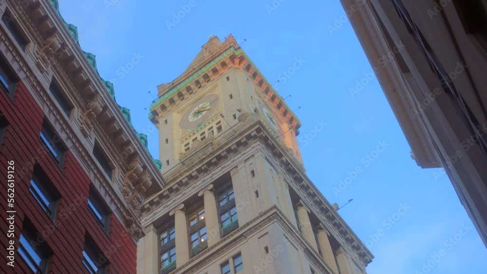 Skyscraper Of Custom House Tower Against Blue Sky In Boston, Massachusetts, USA. Low Angle Shot Skyscraper Of Custom House Tower Against Blue Sky In Boston, Massachusetts, USA. Low Angle Shot