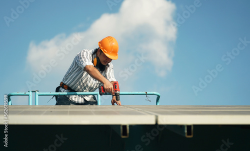 Wallpaper Mural Solar power plant, Electrician working on checking and maintenance, Installing solar panels equipment.  Torontodigital.ca